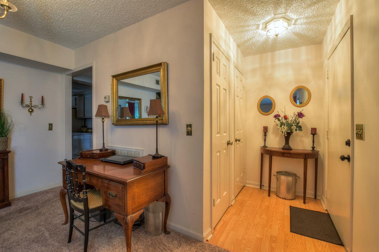 4001 Anderson Road, Unit B128 Nashville, TN 37217 - Photo 10 of 21 a balcony with table and chairs