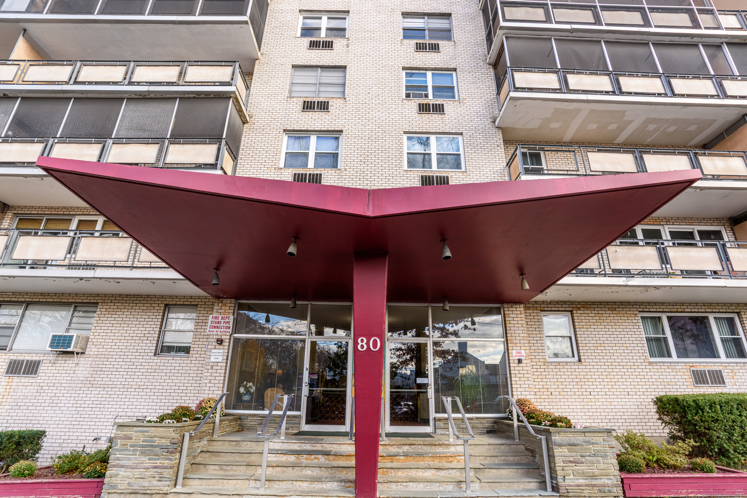 a front view of a building with street