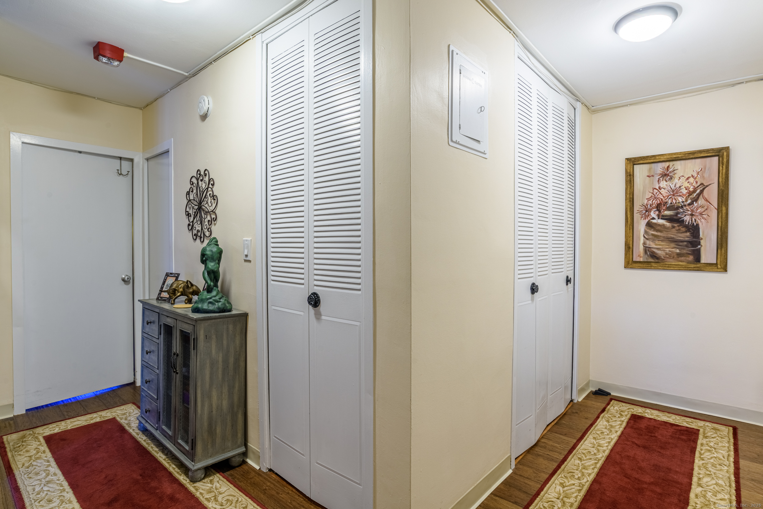 80 Cartright Street, Unit 5D Bridgeport, CT 06604 - Photo 17 of 24 a view of a hallway to rooms
