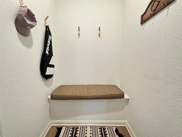 a view of a terrace with a couple of chairs