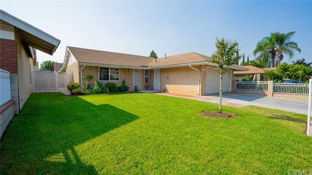 7940 Citadel Court Riverside, CA 92503 - Photo 1 of 1 a front view of house with yard and green space