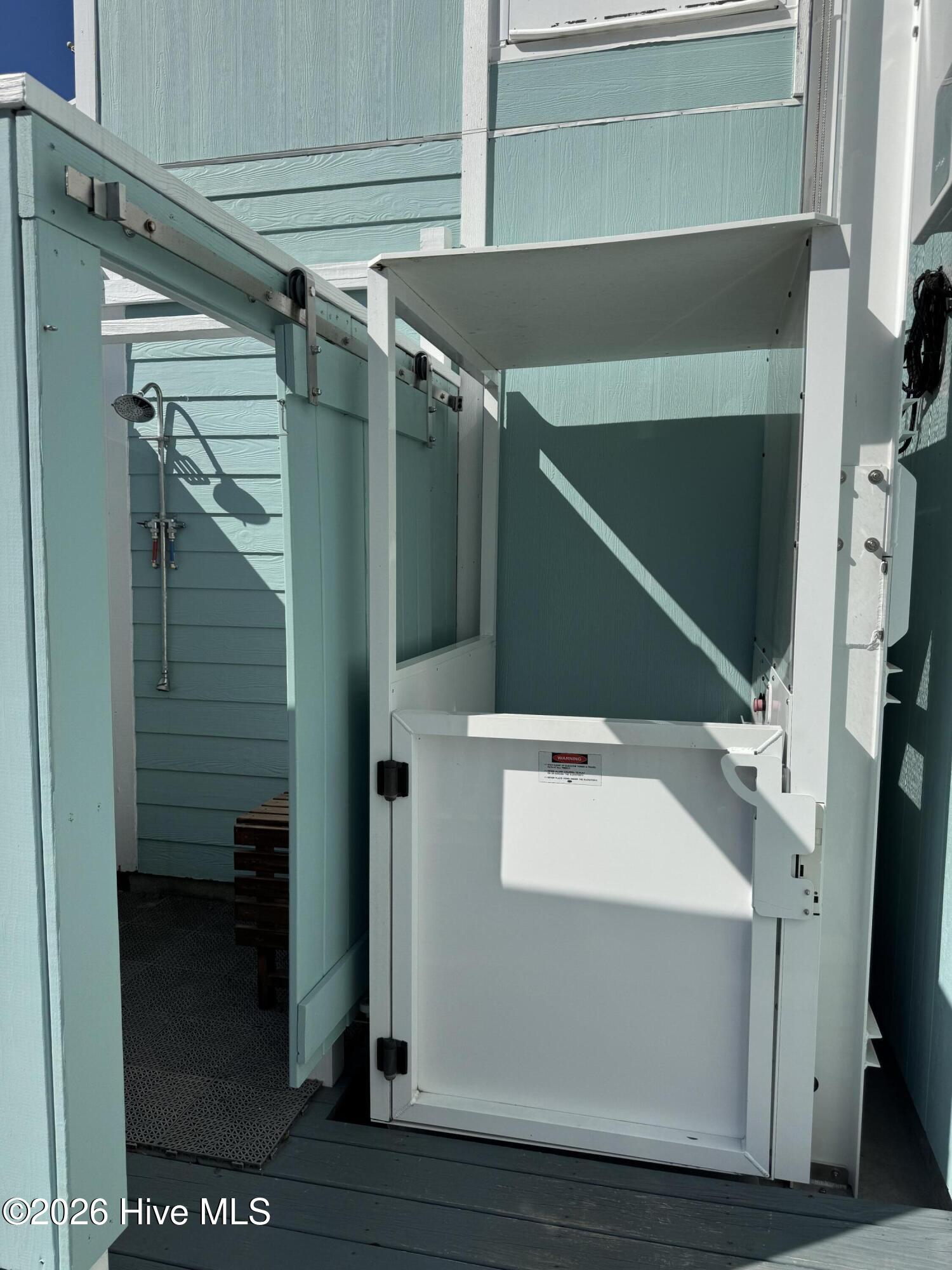 330 Cape Lookout Loop Emerald Isle, NC 28594 - Photo 51 of 80 elevator just newly inspected