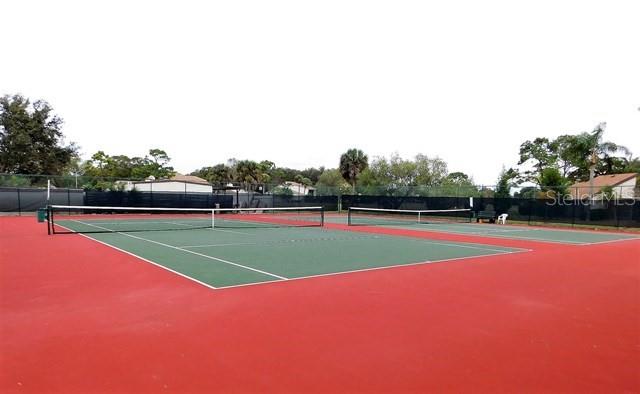 716 White Pine Tree Road, Unit 79 Venice, FL 34285 - Photo 18 of 22 a view of tennis court