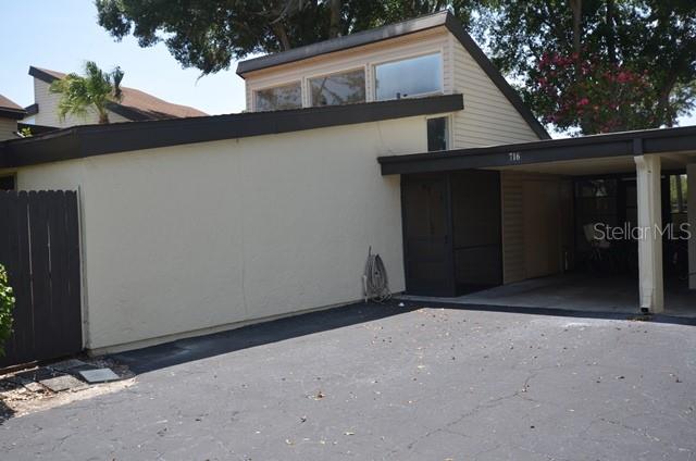 716 White Pine Tree Road, Unit 79 Venice, FL 34285 - Photo 2 of 22 a front view of a house