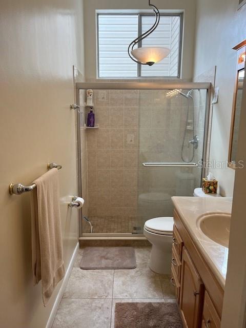 716 White Pine Tree Road, Unit 79 Venice, FL 34285 - Photo 8 of 22 a bathroom with a sink a toilet and shower