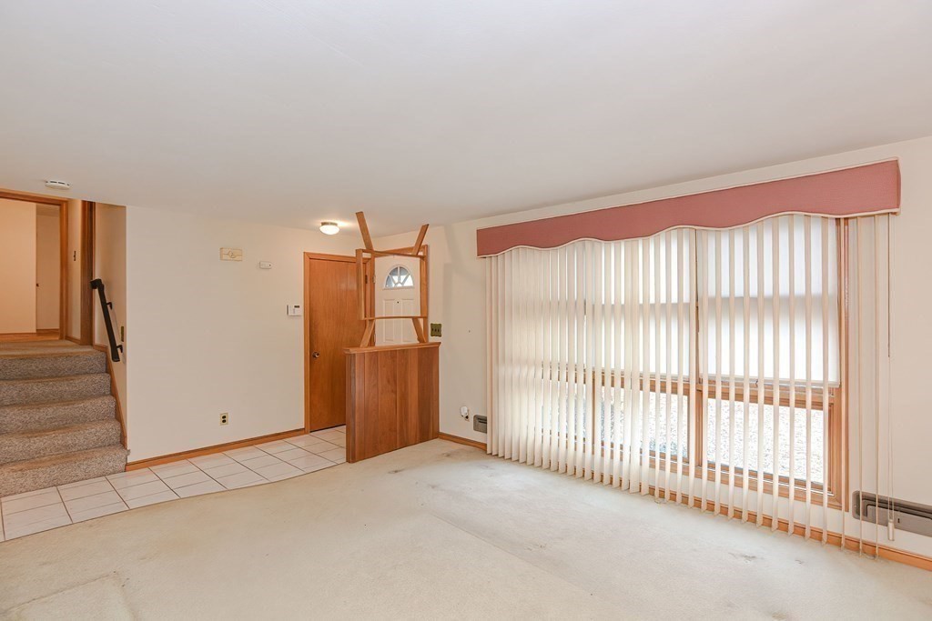 209 3rd Street Stoughton, MA 02072 - Photo 16 of 36 a view of a room with a window