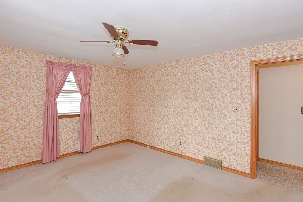 209 3rd Street Stoughton, MA 02072 - Photo 21 of 36 an empty room with windows and closet