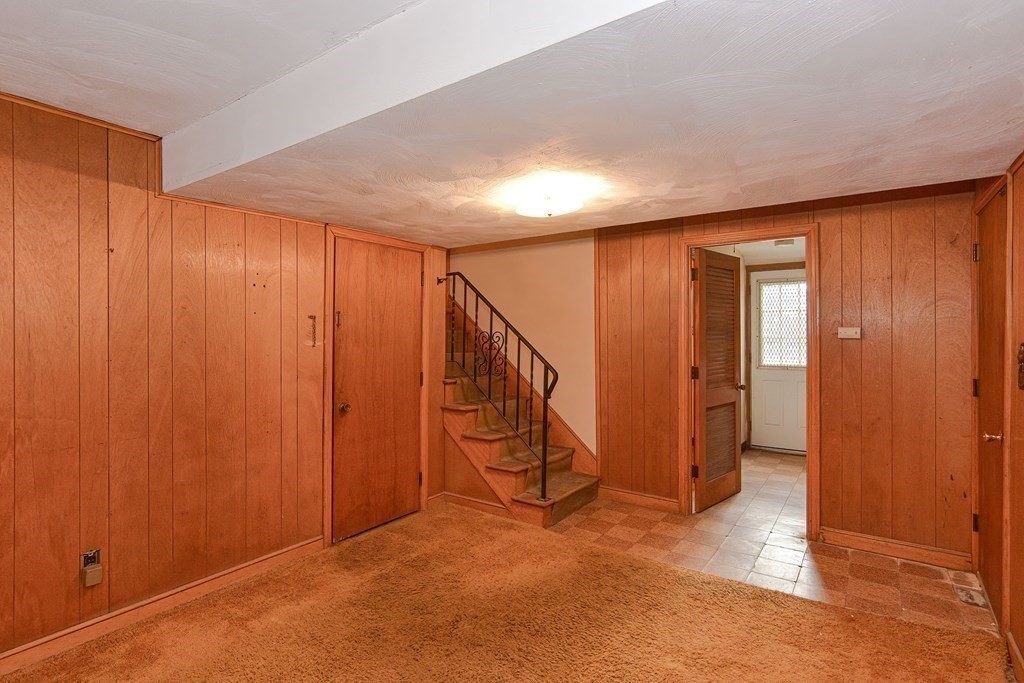 209 3rd Street Stoughton, MA 02072 - Photo 27 of 36 an empty room with stairs