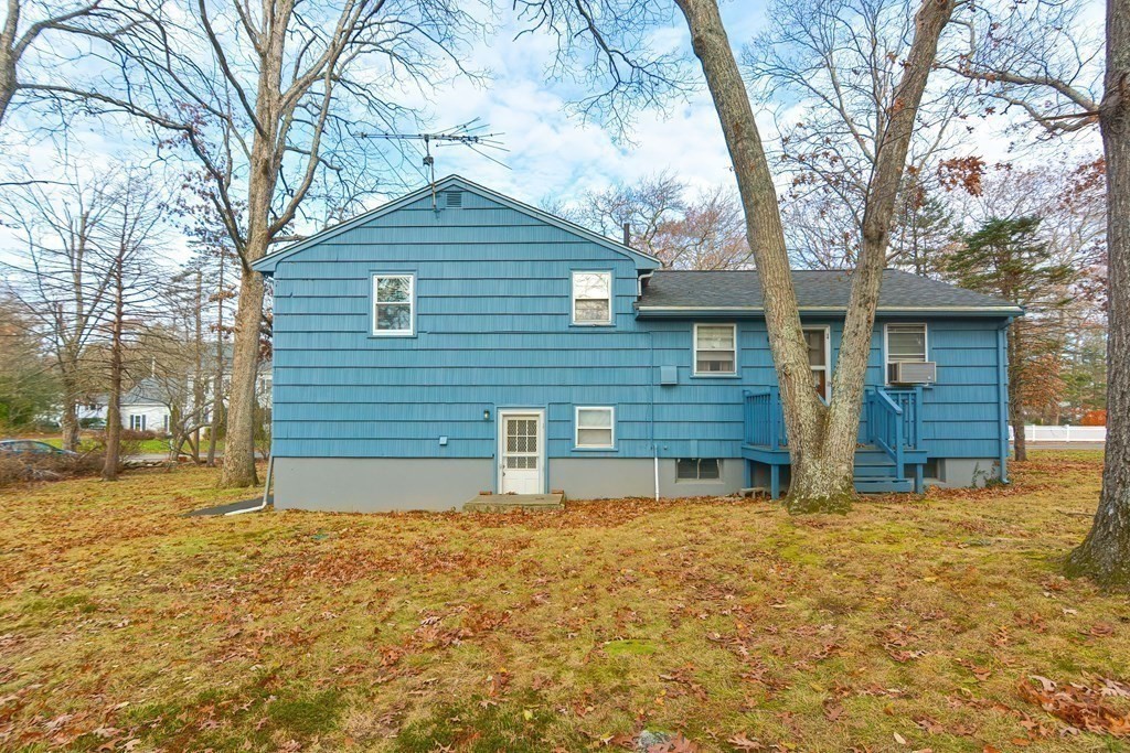 209 3rd Street Stoughton, MA 02072 - Photo 32 of 36 a view of a house with a yard