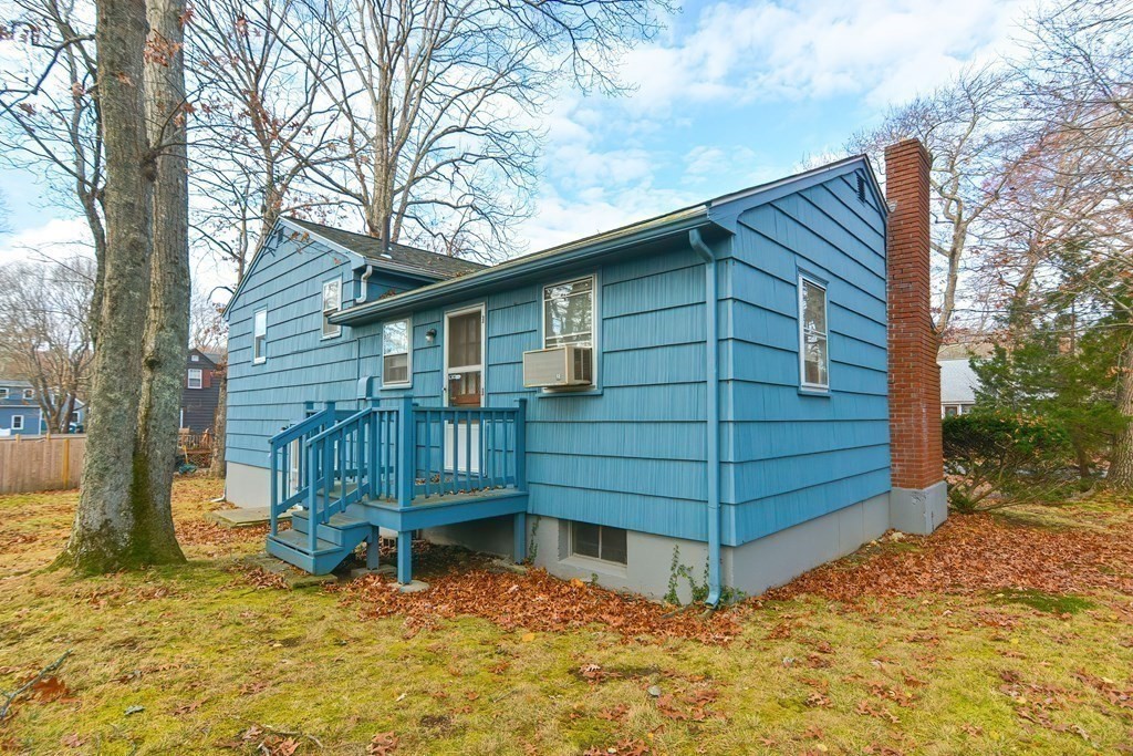 209 3rd Street Stoughton, MA 02072 - Photo 34 of 36 a view of a house with a yard