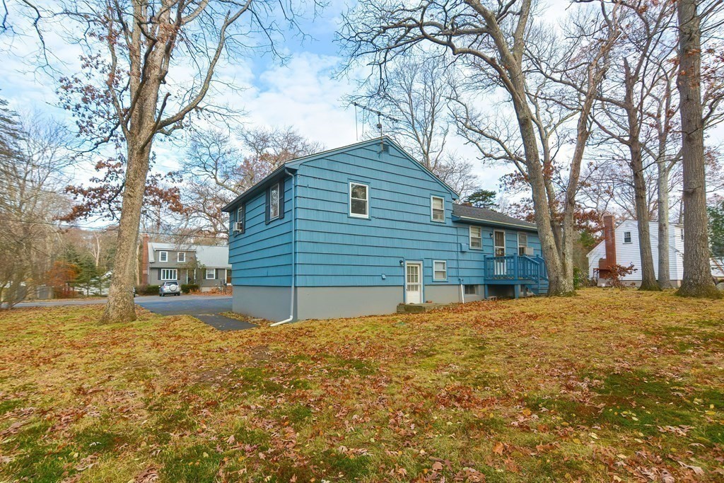 209 3rd Street Stoughton, MA 02072 - Photo 36 of 36 a view of a house with a yard covered with snow
