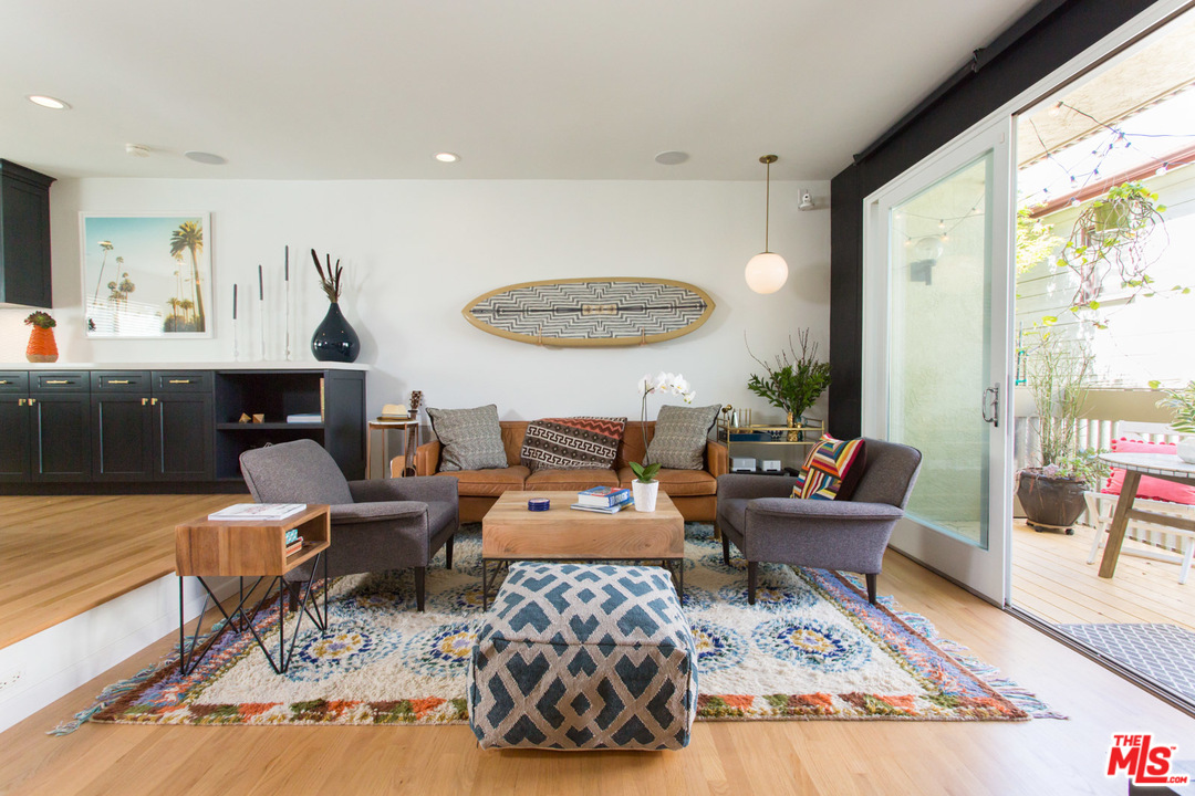 631 Strand Street, Unit 2 Santa Monica, CA 90405 - Photo 2 of 30 a living room with furniture and a large window