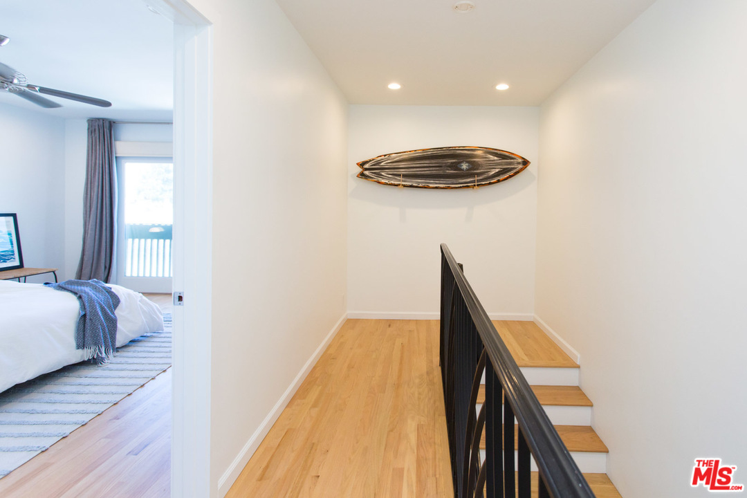 631 Strand Street, Unit 2 Santa Monica, CA 90405 - Photo 11 of 30 a view of a hardwood floor and staircase