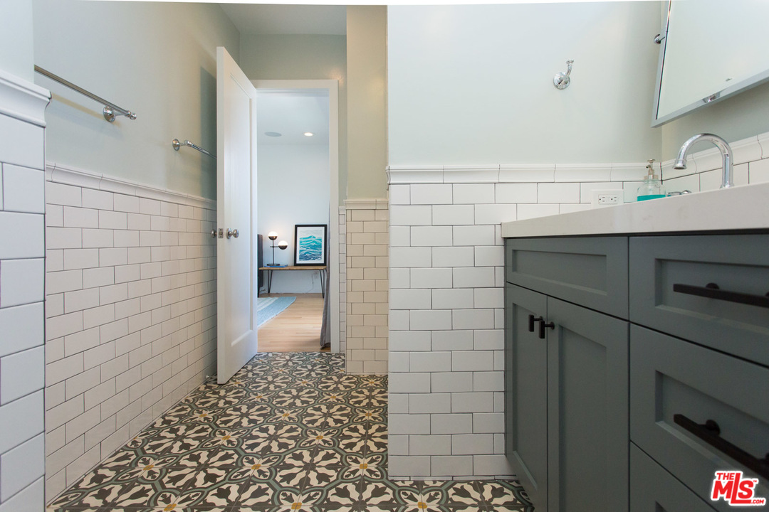 631 Strand Street, Unit 2 Santa Monica, CA 90405 - Photo 15 of 30 a bathroom with a shower and a sink