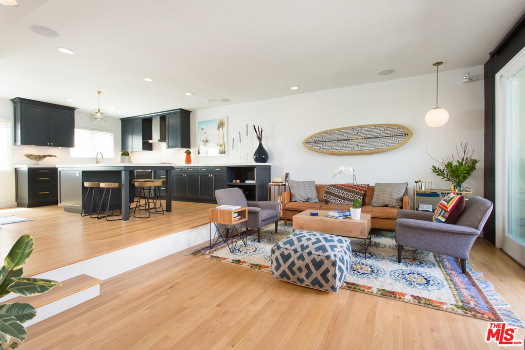 631 Strand Street, Unit 2 Santa Monica, CA 90405 - Photo 3 of 30 a living room with furniture and a wooden floor