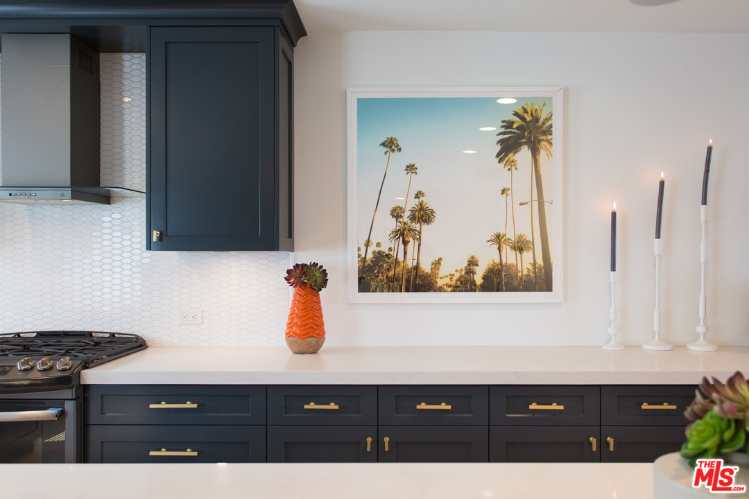 631 Strand Street, Unit 2 Santa Monica, CA 90405 - Photo 7 of 30 a bathroom with a sink vanity and a mirror