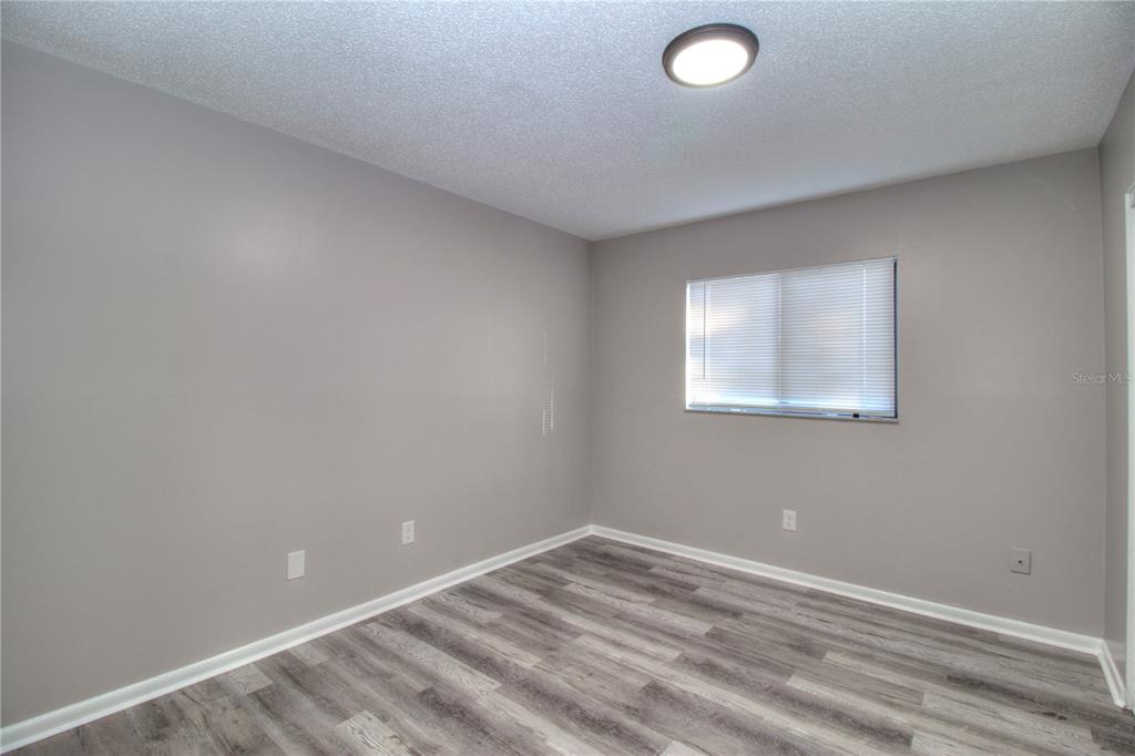 10182 Southwest 87th Terrace Ocala, FL 34481 - Photo 15 of 26 an empty room with a window