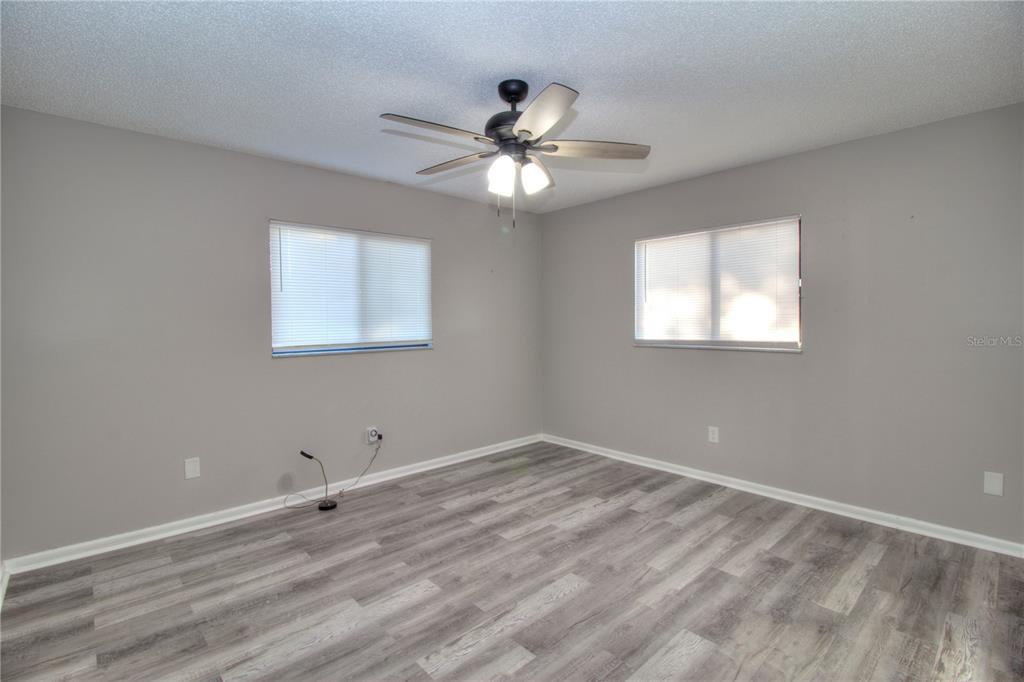 10182 Southwest 87th Terrace Ocala, FL 34481 - Photo 10 of 26 a view of an empty room with a window