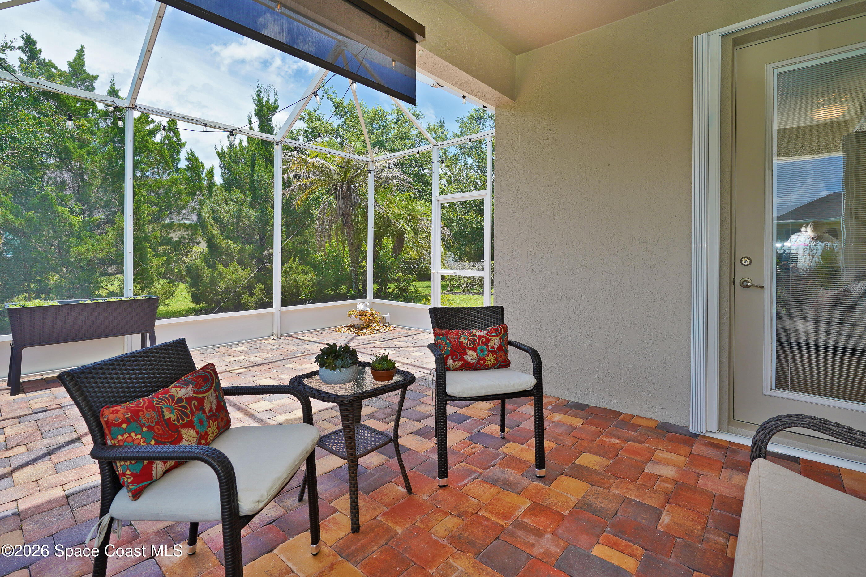 7170 Ralston Street Melbourne, FL 32940 - Photo 20 of 77 Covered Porch also has shade Screen