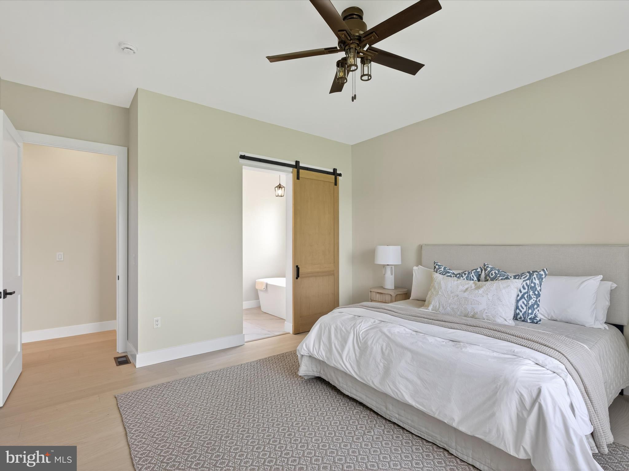 297 Sarsen Drive Lititz, PA 17543 - Photo 35 of 67 a bedroom with a bed and a chandelier