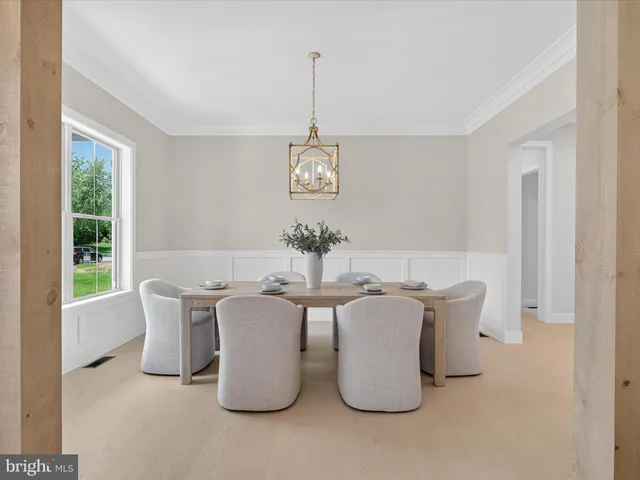 a kitchen with stainless steel appliances a stove a sink and a refrigerator