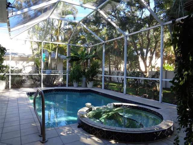 a view of a house with swimming pool