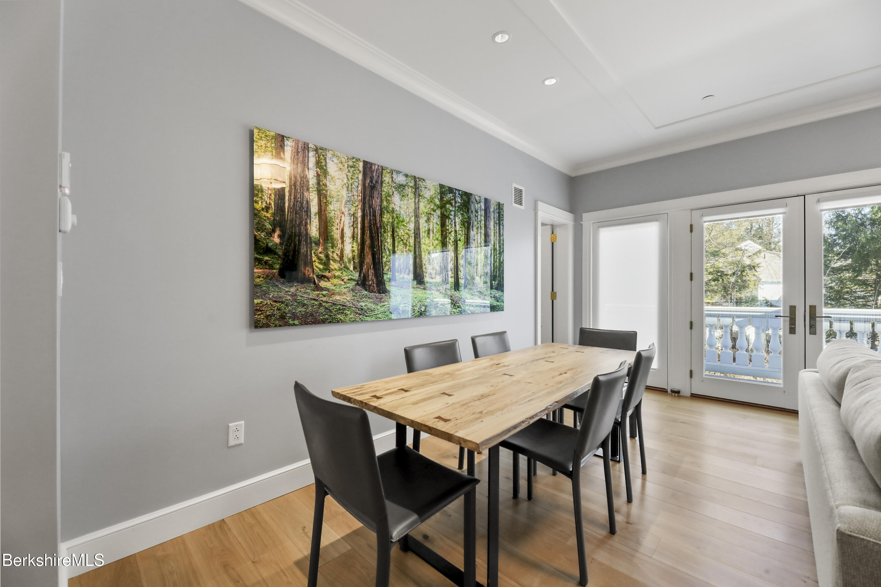165 Kemble Street, Unit 10 Lenox, MA 01240 - Photo 11 of 24 a view of a dining room with furniture window and wooden floor