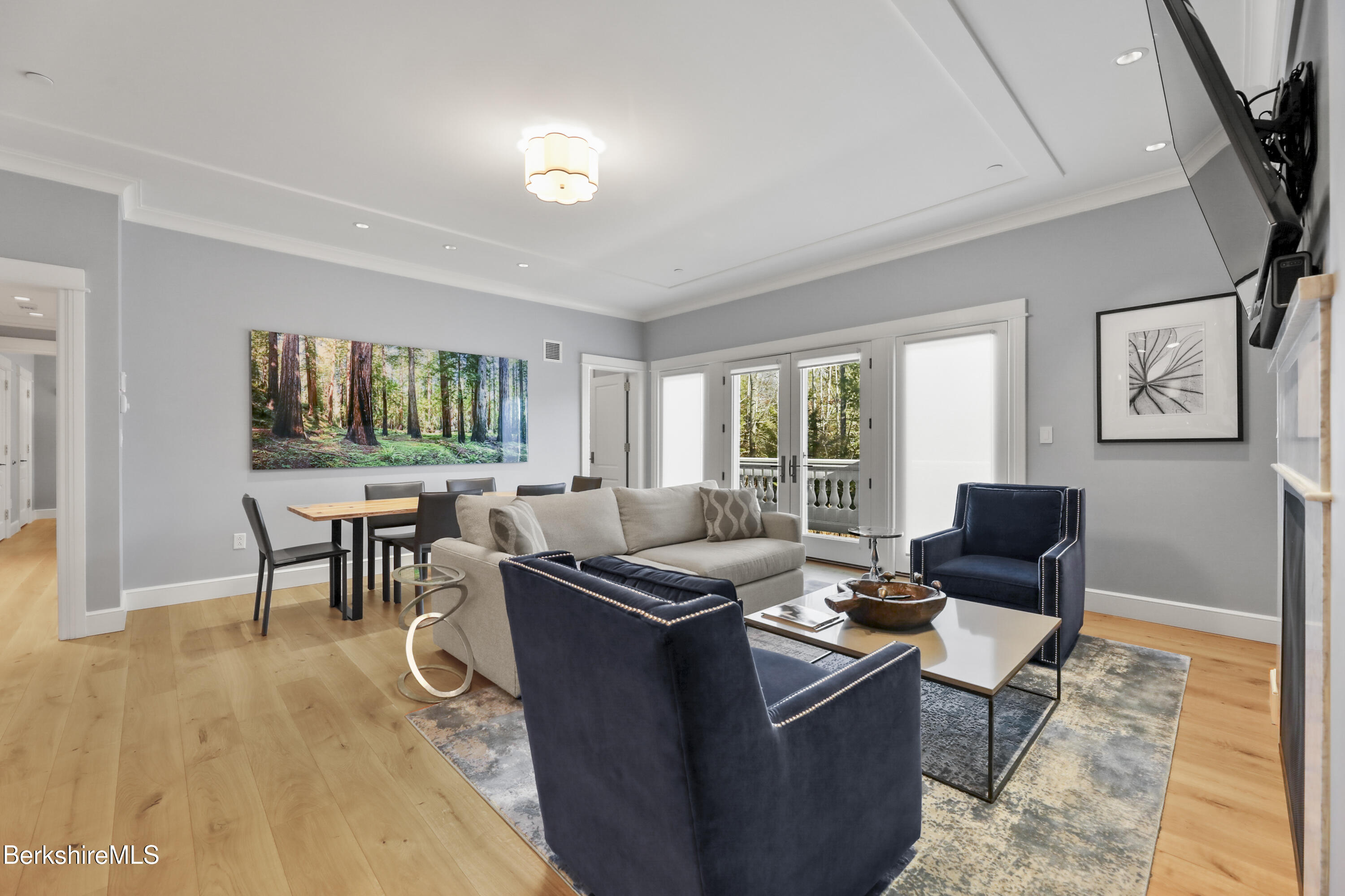 165 Kemble Street, Unit 10 Lenox, MA 01240 - Photo 2 of 24 a living room with furniture and a window