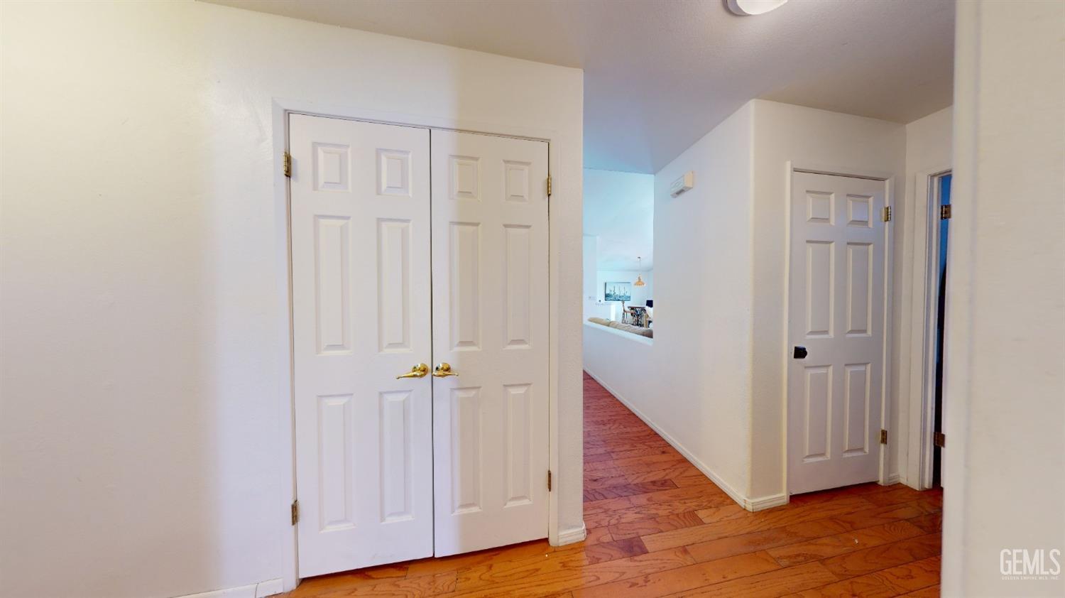Undisclosed Address Bakersfield, CA 93313 - Photo 19 of 37 wooden view of a hallway with wooden floor