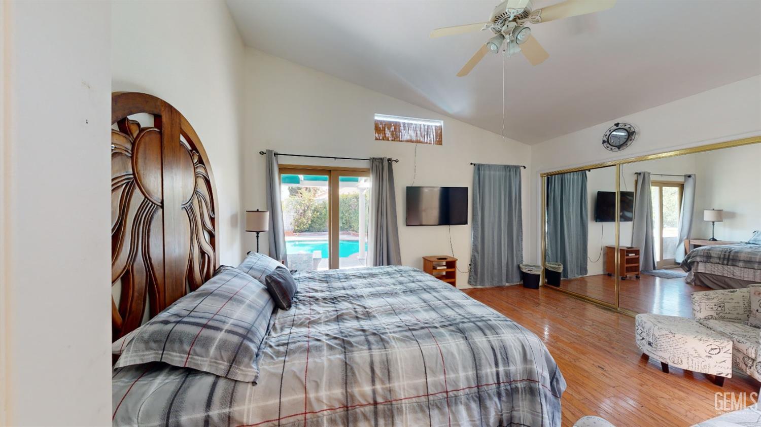 Undisclosed Address Bakersfield, CA 93313 - Photo 20 of 37 a bed sitting in a spacious bedroom next to a window