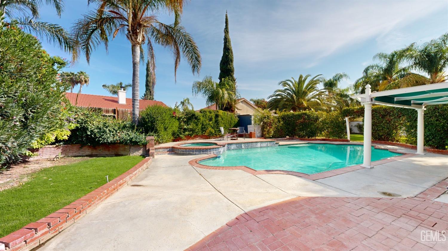 Undisclosed Address Bakersfield, CA 93313 - Photo 28 of 37 a view of a park with palm trees