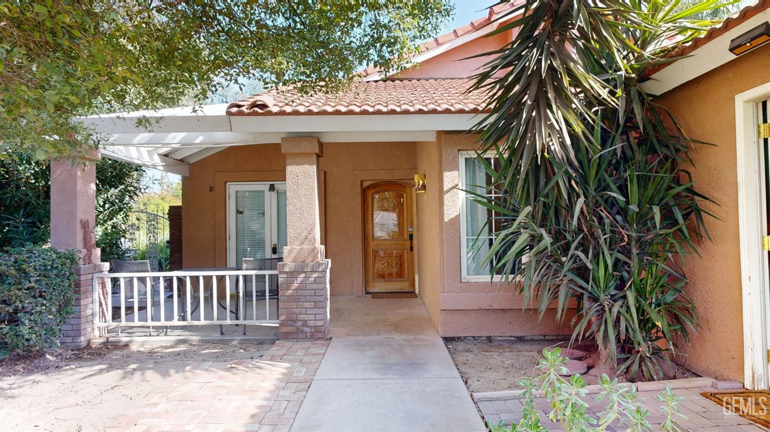 Undisclosed Address Bakersfield, CA 93313 - Photo 3 of 37 a view of a house with a porch