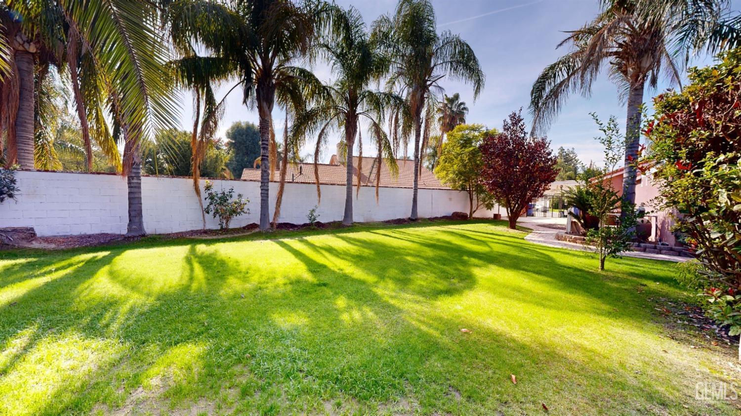 Undisclosed Address Bakersfield, CA 93313 - Photo 33 of 37 a view of swimming pool with a garden