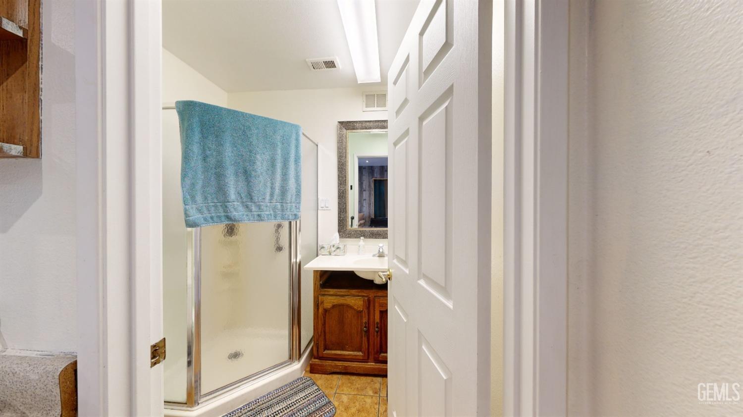 Undisclosed Address Bakersfield, CA 93313 - Photo 36 of 37 a view of front door of house