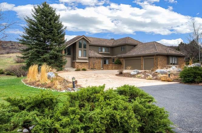 a swimming pool with outdoor seating and yard