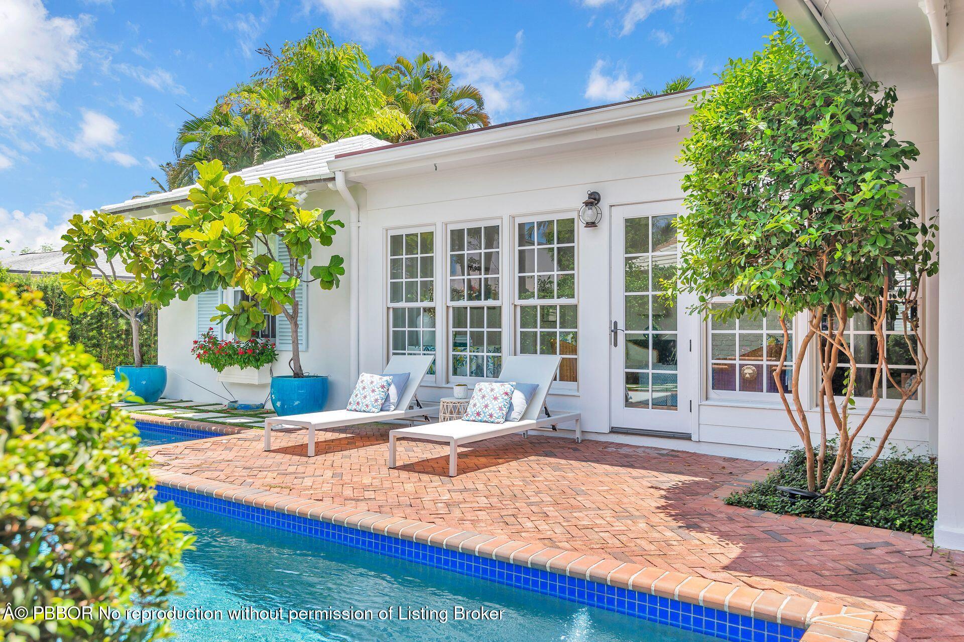 255 Colonial Lane Palm Beach, FL 33480 - Photo 24 of 32 a house view with a sitting space