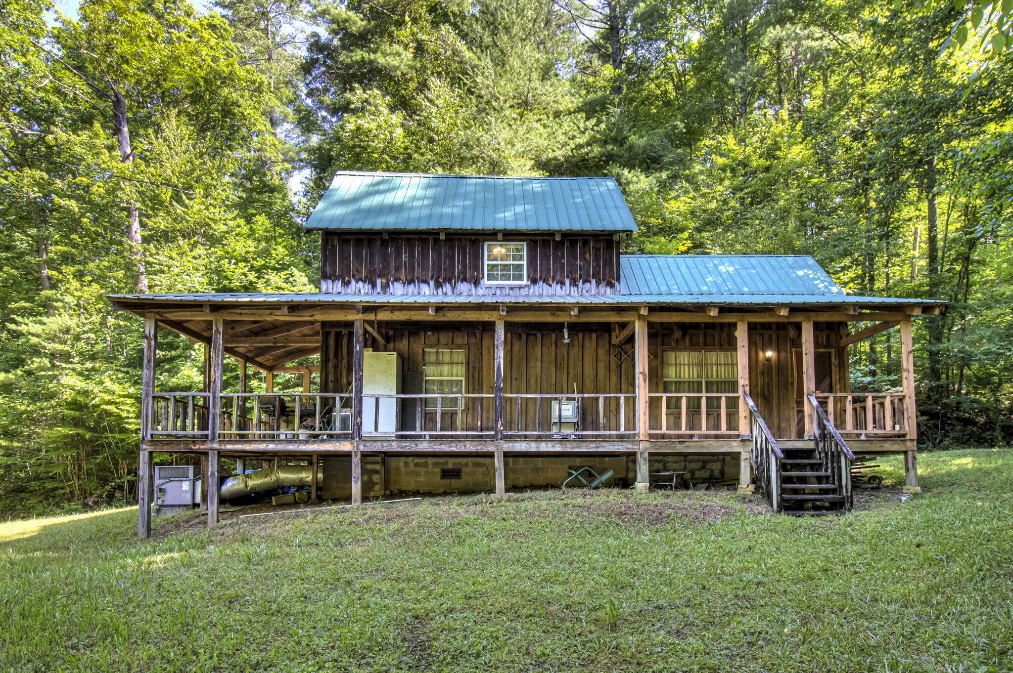 230 Big Towee Road Reliance, TN 37369 - Photo 1 of 69 an aerial view of a house with swimming pool and sitting area