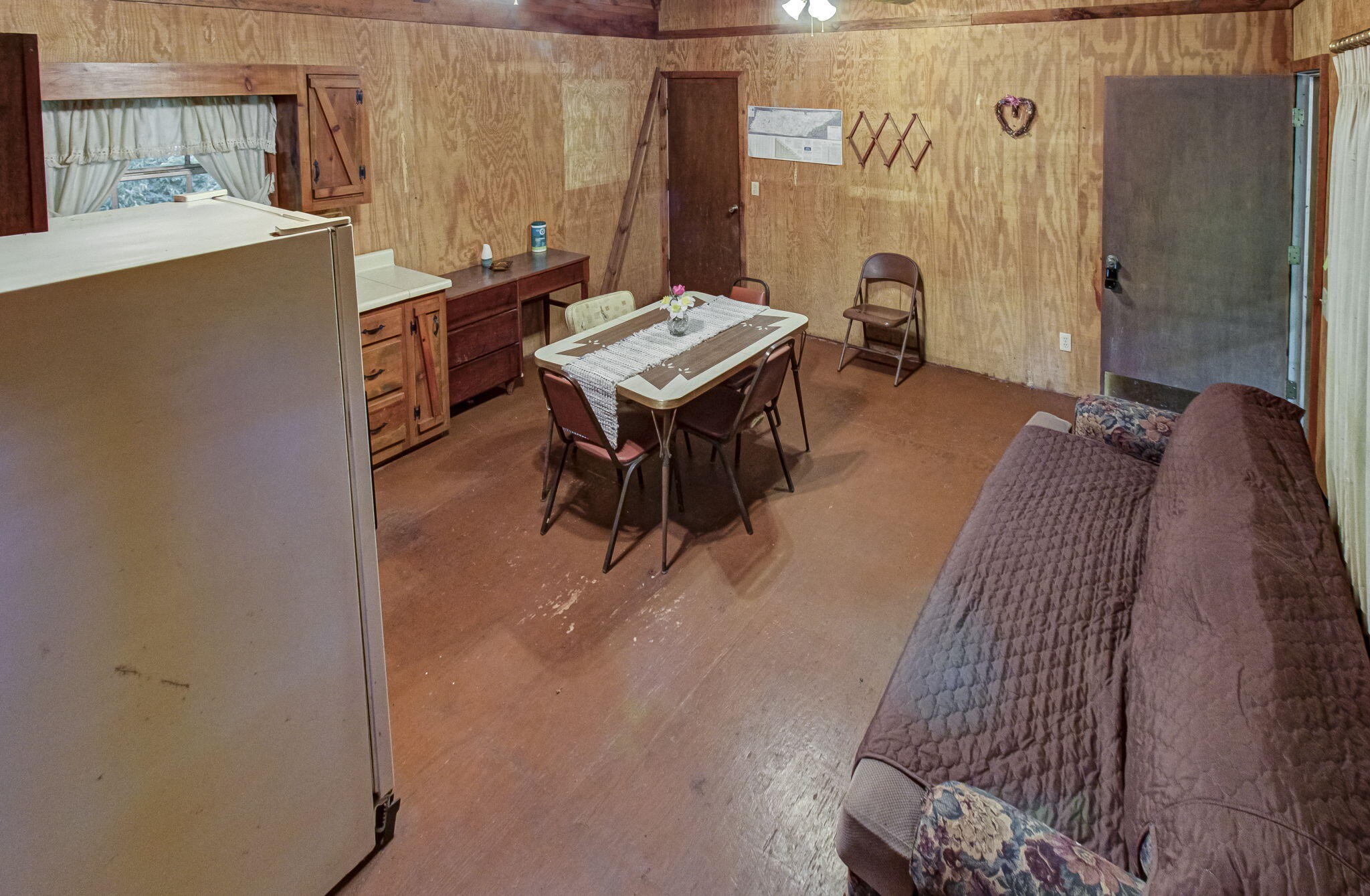 230 Big Towee Road Reliance, TN 37369 - Photo 20 of 69 a dining room with a sink and a mirror