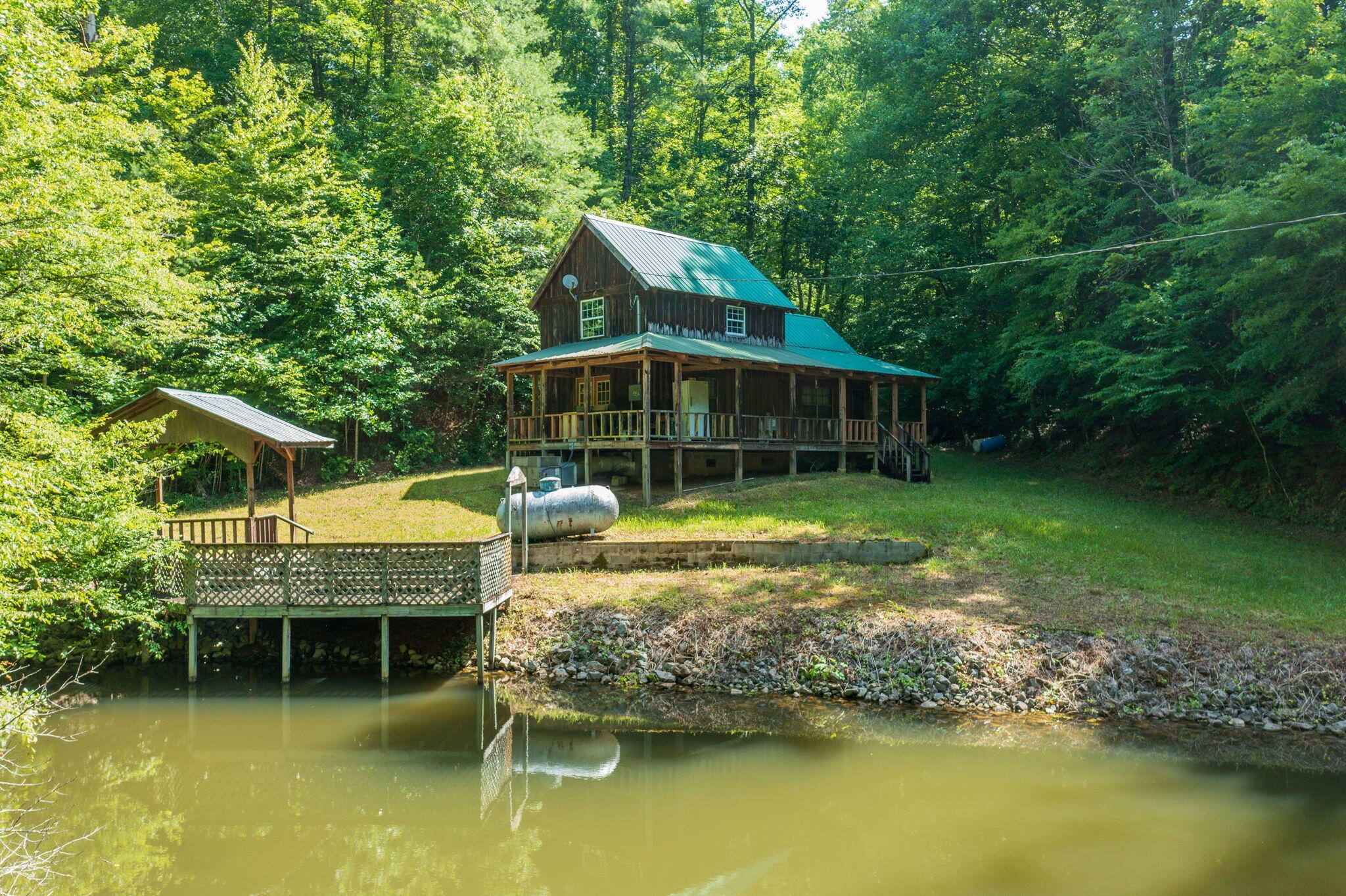 230 Big Towee Road Reliance, TN 37369 - Photo 44 of 69 a view of a house with a swimming pool