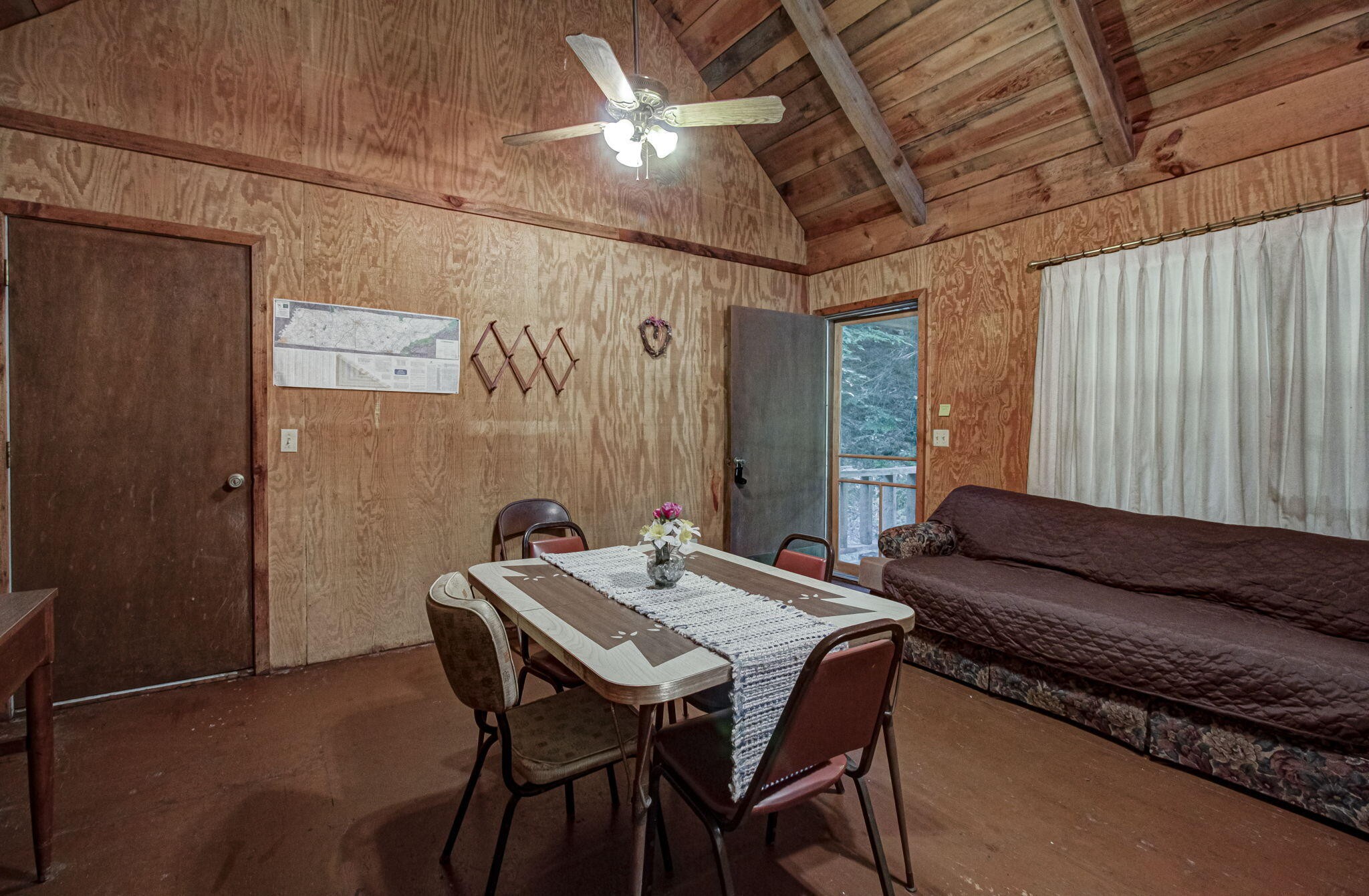 230 Big Towee Road Reliance, TN 37369 - Photo 5 of 69 a view of a dining room with furniture and a chandelier