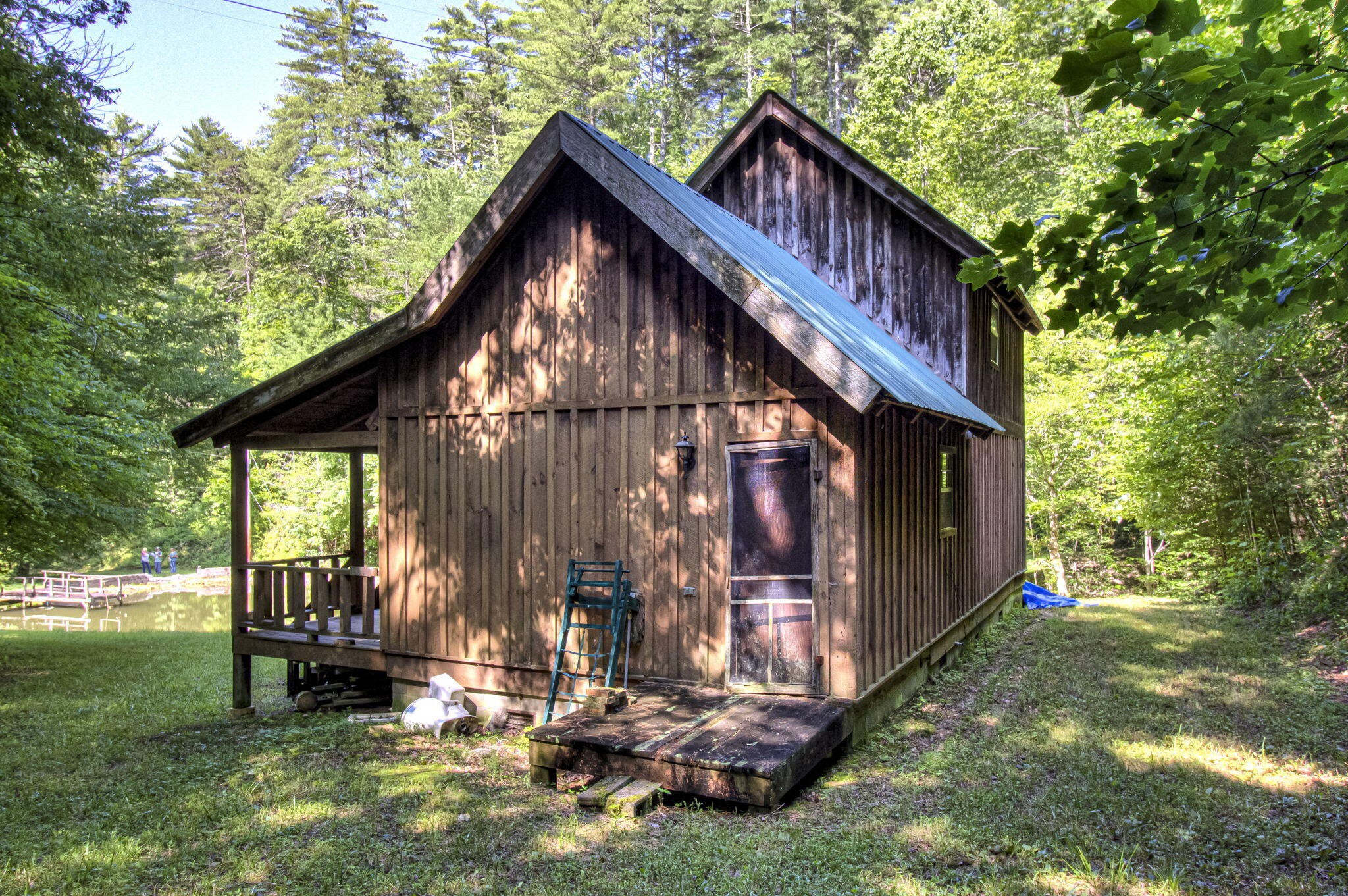 230 Big Towee Road Reliance, TN 37369 - Photo 66 of 69 a backyard of a house with table and chairs