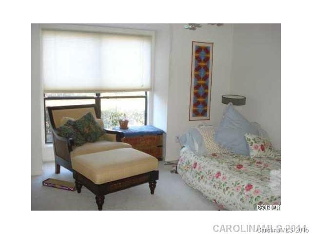 11103 Harrowfield Road Charlotte, NC 28226 - Photo 3 of 9 a living room with furniture and a large window