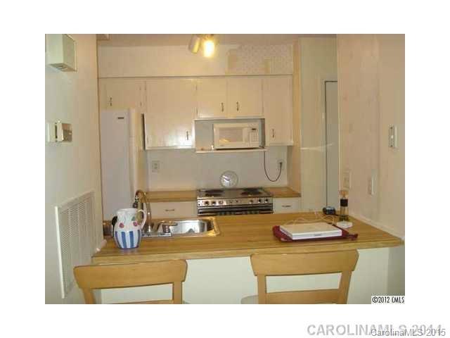 11103 Harrowfield Road Charlotte, NC 28226 - Photo 6 of 9 a bathroom with a sink and a mirror