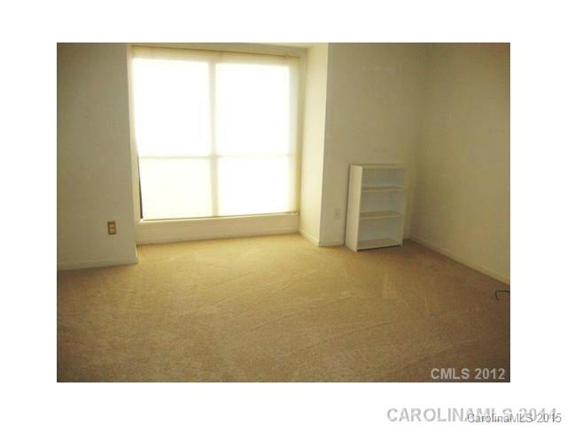 11103 Harrowfield Road Charlotte, NC 28226 - Photo 8 of 9 a view of an empty room with a window