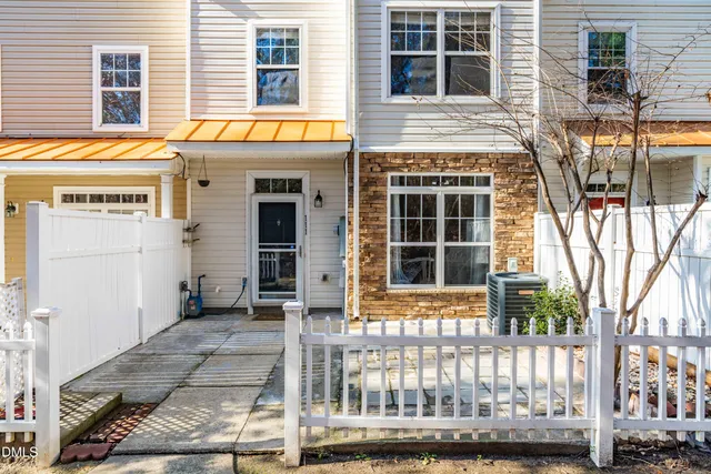 a front view of a house with a porch