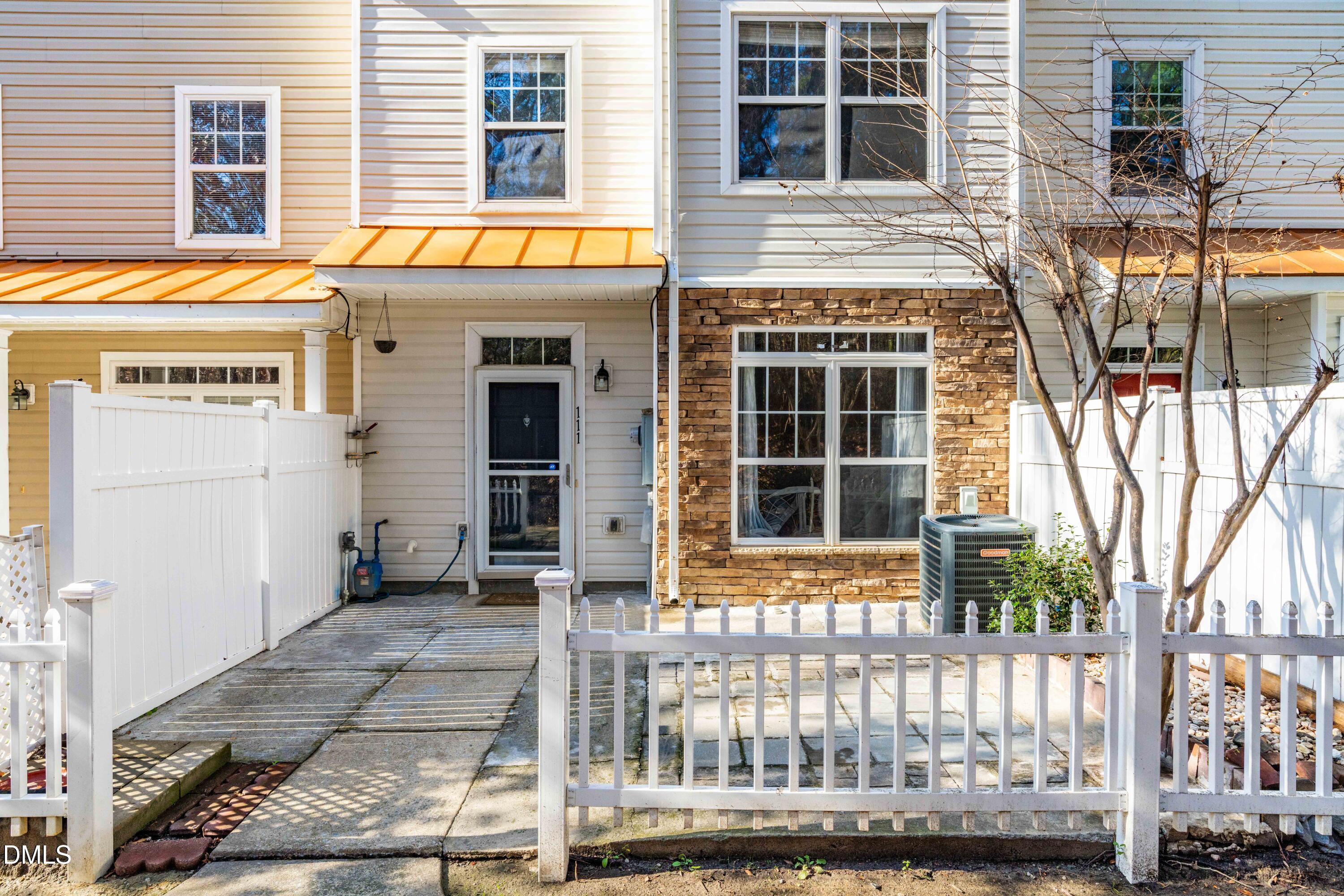a front view of a house with a porch