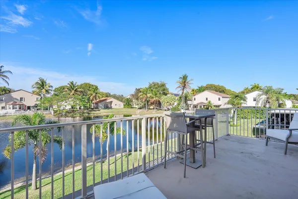 a view of a chairs and table on the wooden floor
