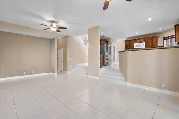 a view of a livingroom with a ceiling fan