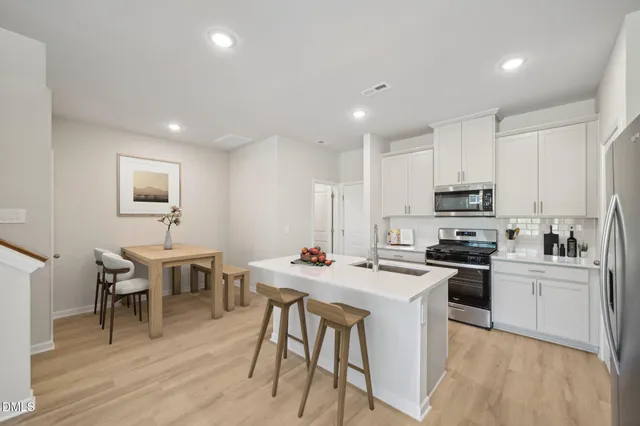a view of kitchen with wooden floor