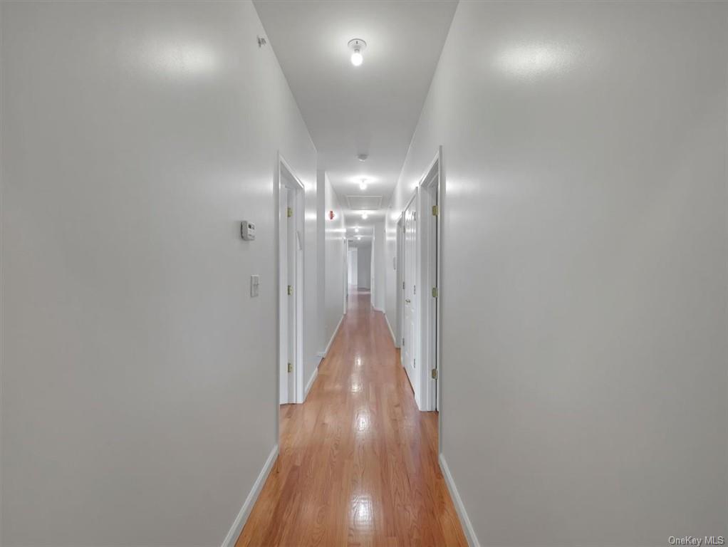 480 West Central Avenue Spring Valley, NY 10977 - Photo 14 of 35 a view of a hallway with wooden floor